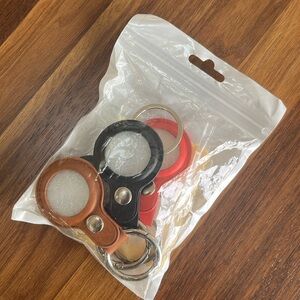 Four pack unopened key chain for Apple air tag